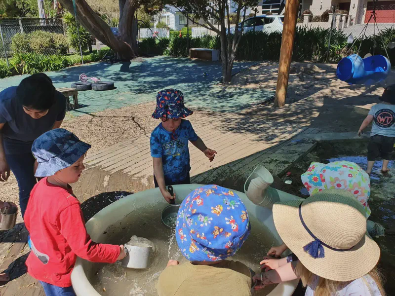 Children enjoying water play outdoors